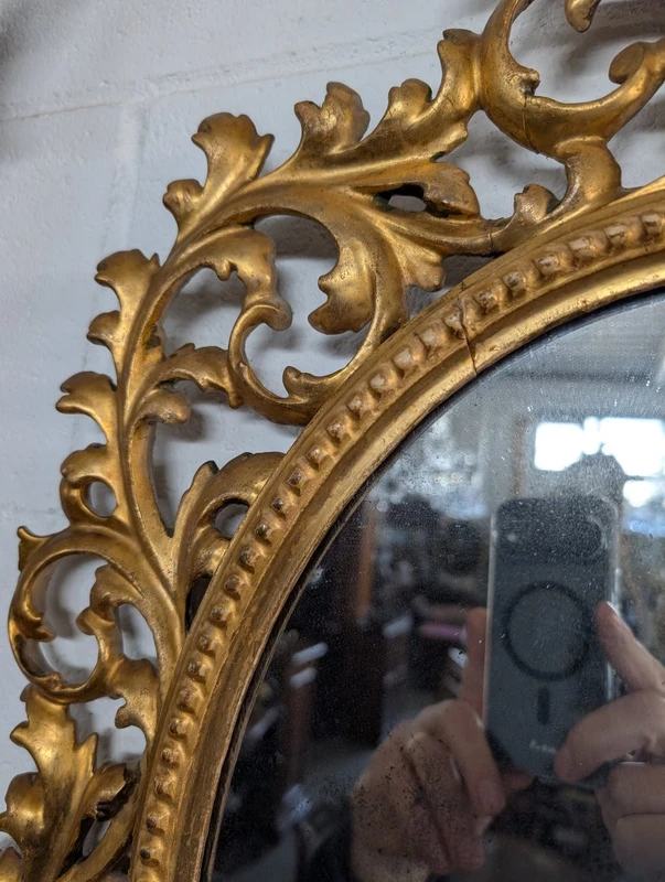 Florentine oval mirror in carved wood gilded with pure gold - mid-19th century