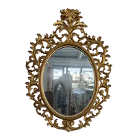 Florentine oval mirror in carved wood gilded with pure gold - mid-19th century