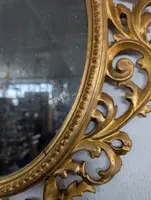 Florentine oval mirror in carved wood gilded with pure gold - mid-19th century