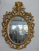 Florentine oval mirror in carved wood gilded with pure gold - mid-19th century