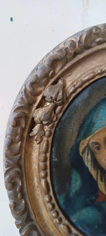 Peinture ancienne dans un cadre ovale, visage de la Madone