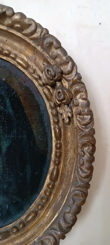 Peinture ancienne dans un cadre ovale, visage de la Madone