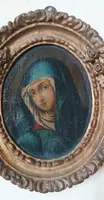 Peinture ancienne dans un cadre ovale, visage de la Madone