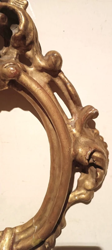 Cornice antica ovale dorata e intagliata Luigi XIV -Toscana XVII secolo