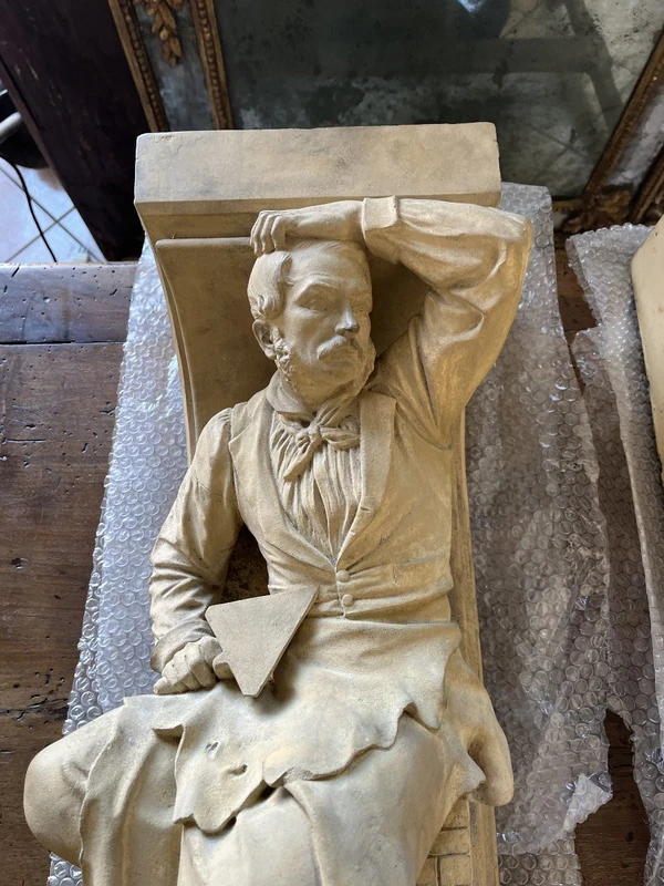 Coppia di elementi scultorei in terracotta – Firmati e datati 1866 “W. Wolff”