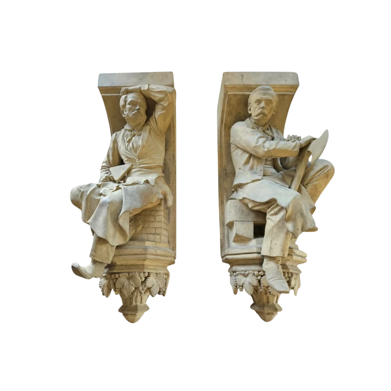 Coppia di elementi scultorei in terracotta – Firmati e datati 1866 “W. Wolff”