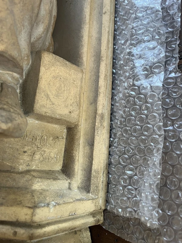 Coppia di elementi scultorei in terracotta – Firmati e datati 1866 “W. Wolff”