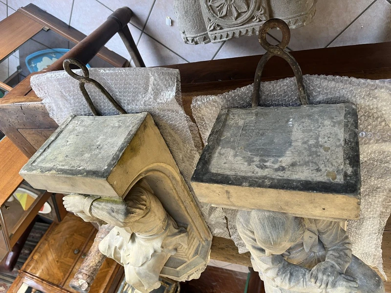 Coppia di elementi scultorei in terracotta – Firmati e datati 1866 “W. Wolff”