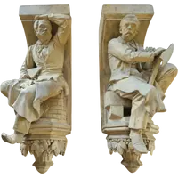 Coppia di elementi scultorei in terracotta – Firmati e datati 1866 “W. Wolff”