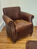 Pair of leather armchairs with footstool pouf - 20th century