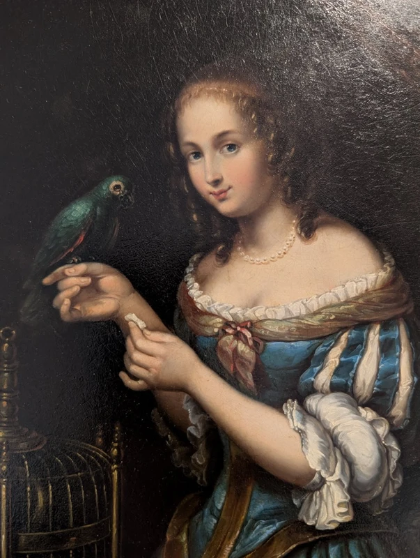Dipinto olio su metallo con scena di giovane donna e pappagallo, metà XIX secolo