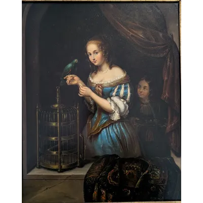 Oil on metal painting with scene of young woman and parrot, mid-19th century