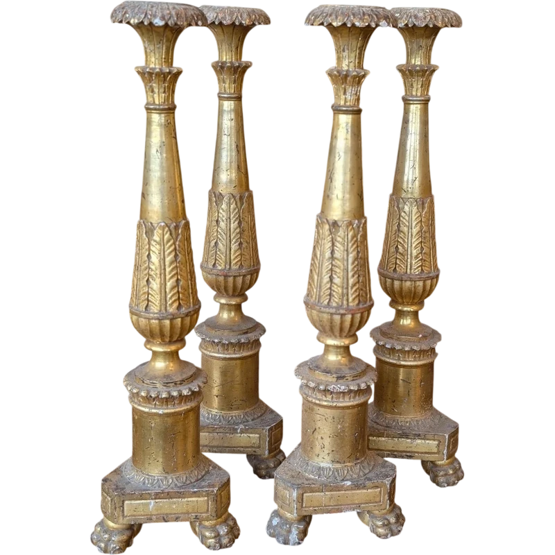 Four Louis XVI gilded wooden mecha candlesticks, late 18th century