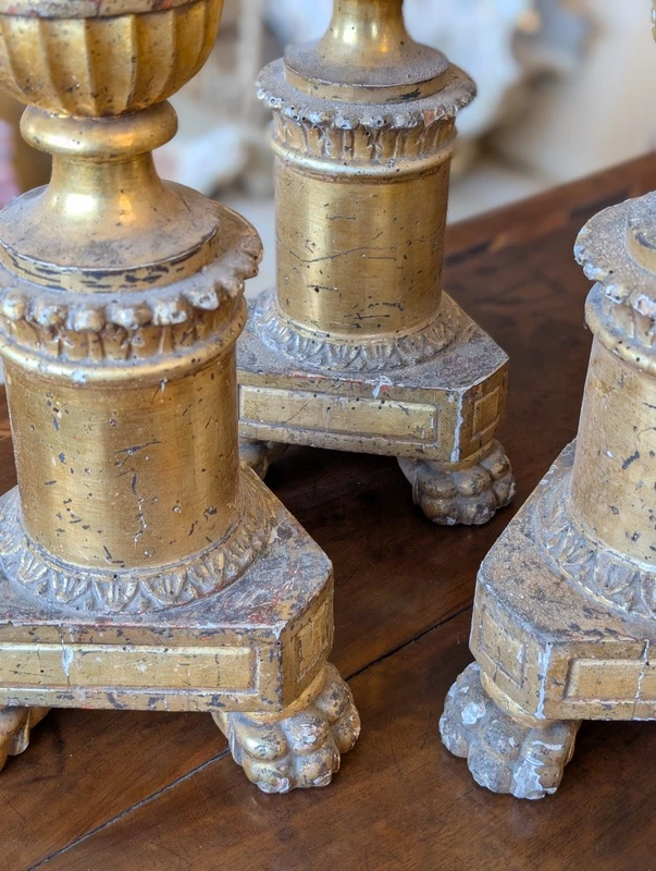 Four Louis XVI gilded wooden mecha candlesticks, late 18th century