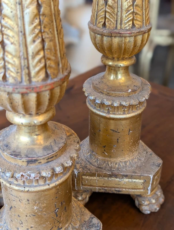 Four Louis XVI gilded wooden mecha candlesticks, late 18th century