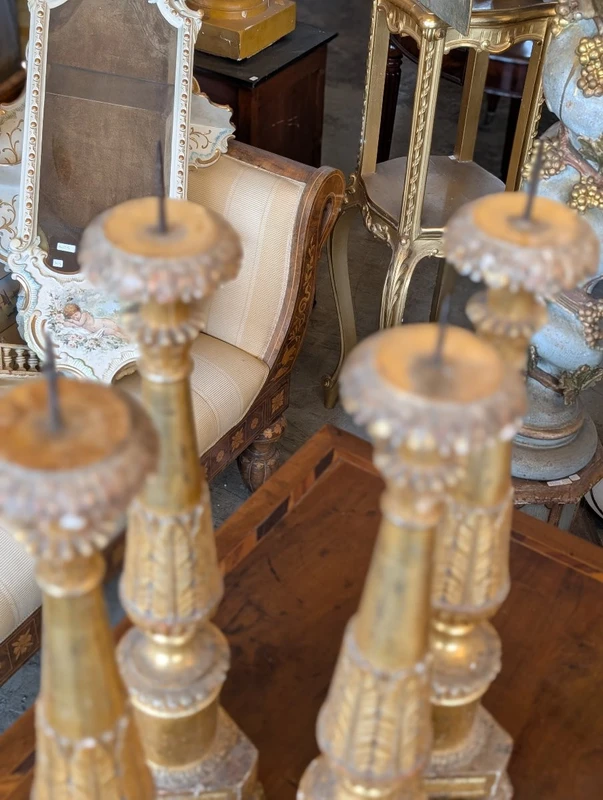 Four Louis XVI gilded wooden mecha candlesticks, late 18th century