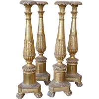 Four Louis XVI gilded wooden mecha candlesticks, late 18th century