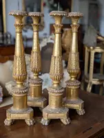 Four Louis XVI gilded wooden mecha candlesticks, late 18th century