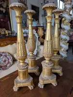 Four Louis XVI gilded wooden mecha candlesticks, late 18th century