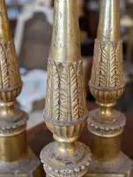 Four Louis XVI gilded wooden mecha candlesticks, late 18th century