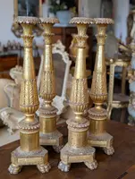 Four Louis XVI gilded wooden mecha candlesticks, late 18th century