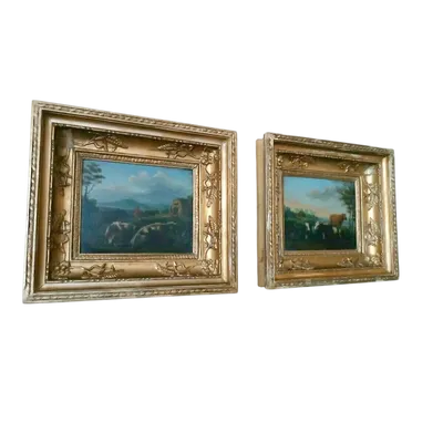 Pair of antique paintings on wood, bucolic landscape