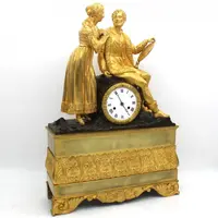 Pendule ancienne en bronze doré 19ème siècle