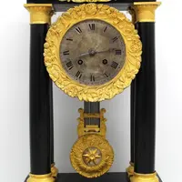 Antico orologio a pendolo Impero 19°secolo