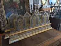 Pair of carved and gilded wooden altar friezes