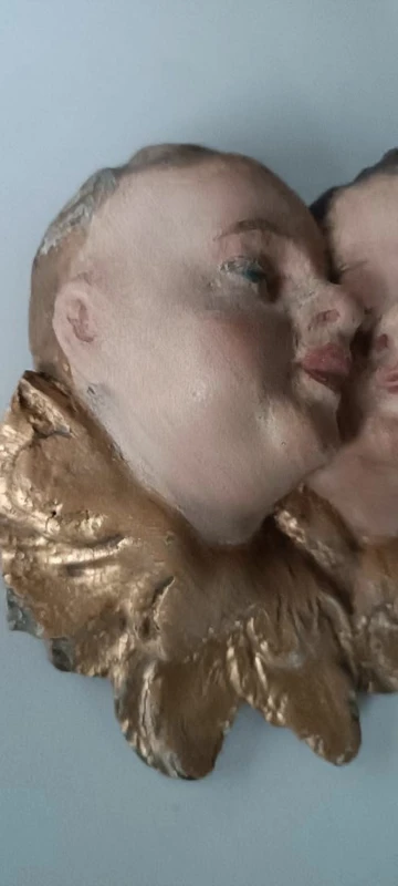 Antique baroque polychrome cherub heads
