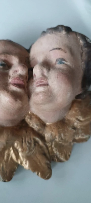 Antique baroque polychrome cherub heads
