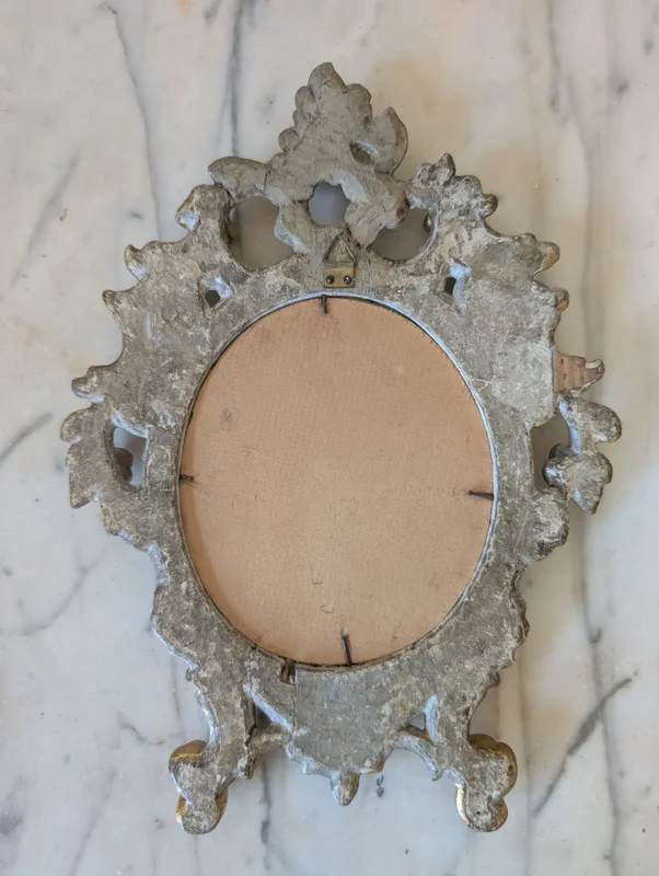 Pair of carved and gilded wooden wall mirrors
