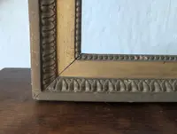 Gilt wood frame with ribbed cyma