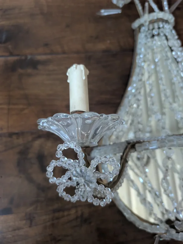 Pair of crystal and gold metal wall sconces