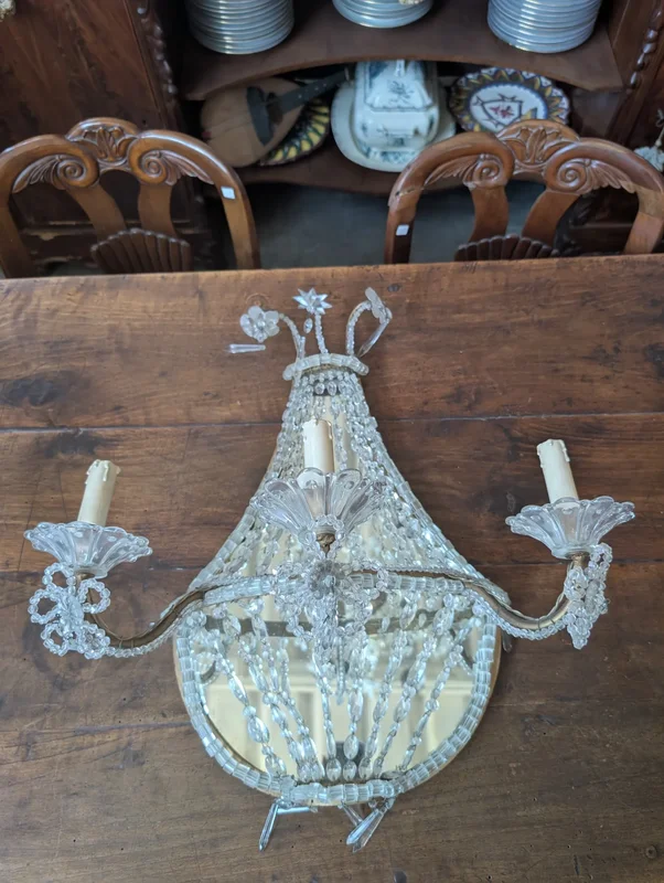 Pair of crystal and gold metal wall sconces