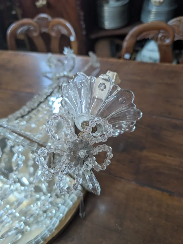 Pair of crystal and gold metal wall sconces