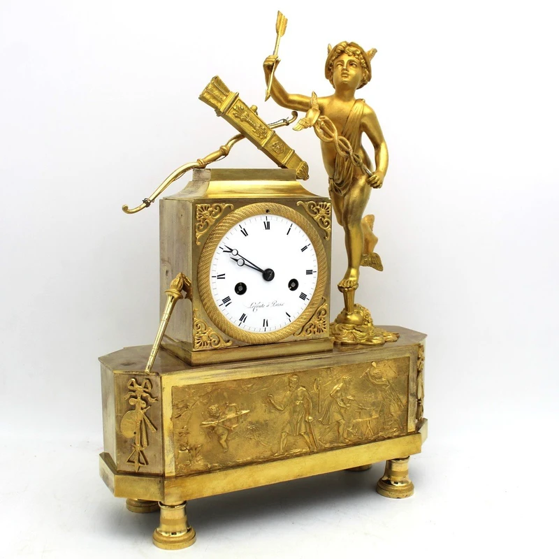 Pendule Empire ancienne en bronze doré 19ème siècle