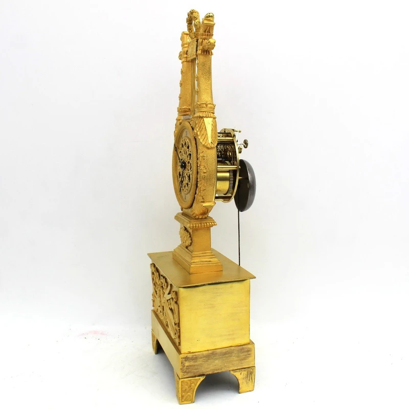 Antico orologio a pendolo Impero in bronzo dorato 19°secolo