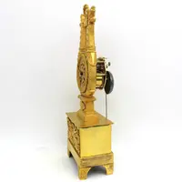 Antico orologio a pendolo Impero in bronzo dorato 19°secolo