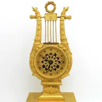 Antico orologio a pendolo Impero in bronzo dorato 19°secolo