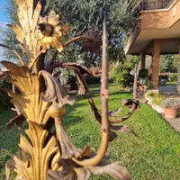 Coppia di candelabri del 1800 in lamierino dorato