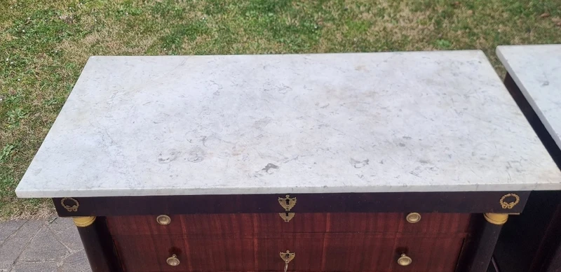 Pair of early Empire mahogany chests of drawers 1810 white marble
