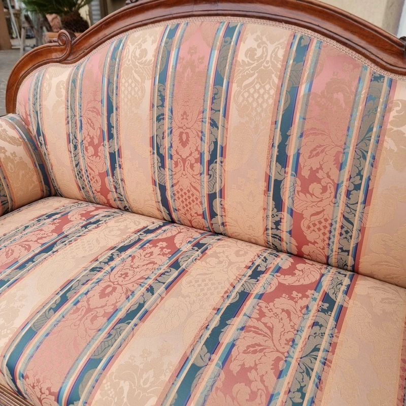 The Timeless Elegance of an 1800s Venetian Sofa in Walnut