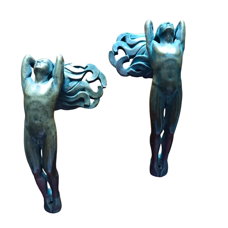 Pair of bronze handles in lost wax casting two naked men 1910