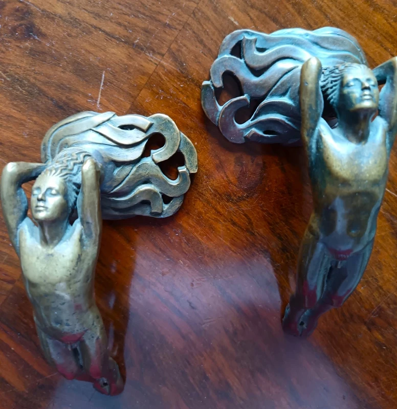 Pair of bronze handles in lost wax casting two naked men 1910