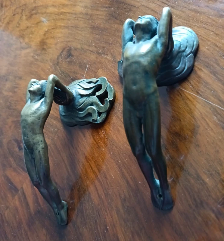 Pair of bronze handles in lost wax casting two naked men 1910