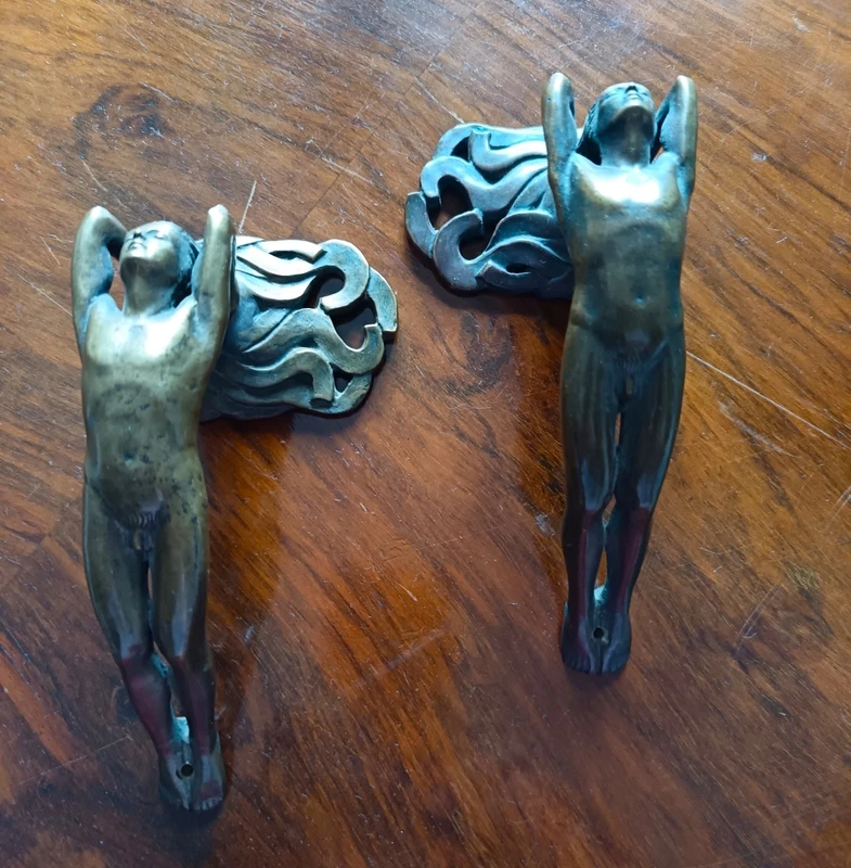Pair of bronze handles in lost wax casting two naked men 1910