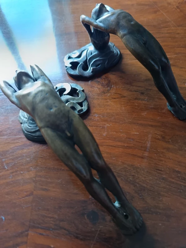 Pair of bronze handles in lost wax casting two naked men 1910