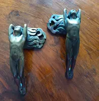 Pair of bronze handles in lost wax casting two naked men 1910