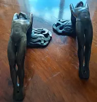 Pair of bronze handles in lost wax casting two naked men 1910